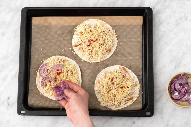 Top each tortilla