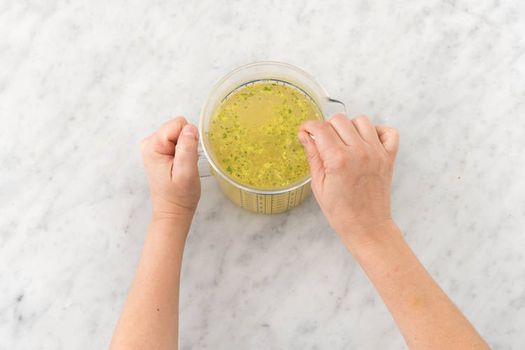 Combine the boiling water and stock