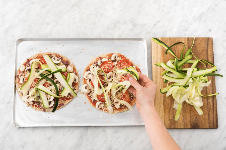 ADD THE PIZZA TOPPINGS