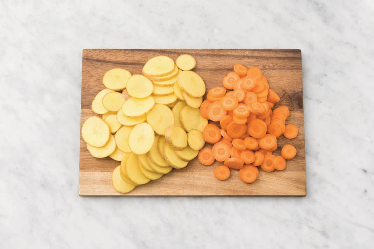 COOK THE POTATO AND CARROT