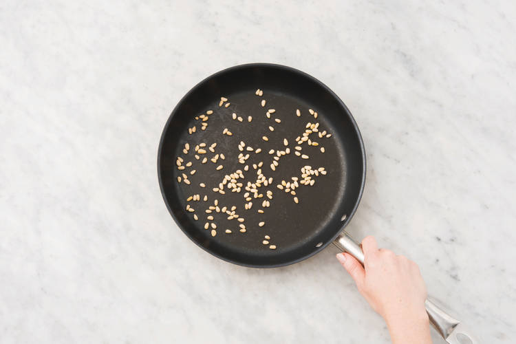 Toast the pine nuts
