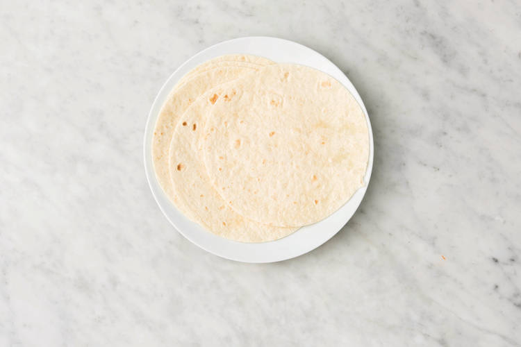 Heat the chapati wraps